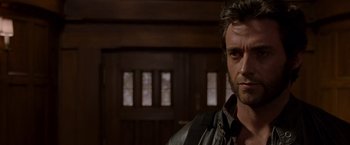 Movie still from “X2” (2003), directed by Bryan Singer – A person wearing a leather jacket; Close Up shot, Over the shoulder angle