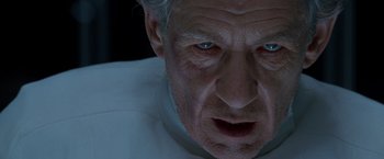 Movie still from “X2” (2003), directed by Bryan Singer – An old man with a white beard and blue eyes; Close Up shot, Low angle
