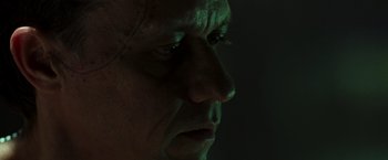 Movie still from “X2” (2003), directed by Bryan Singer – A man's face in the dark; Extreme Close Up shot, Low angle