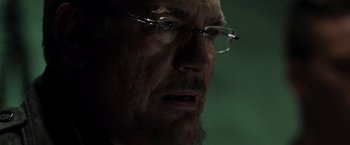 Movie still from “X2” (2003), directed by Bryan Singer – An old man with a beard wearing glasses; Close Up shot, Over the shoulder angle