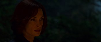 Movie still from “X2” (2003), directed by Bryan Singer – A woman's face in the dark; Close Up shot, Low angle