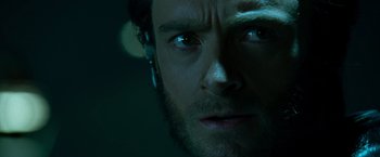 Movie still from “X2” (2003), directed by Bryan Singer – A person wearing a headset; Close Up shot, Over the shoulder angle
