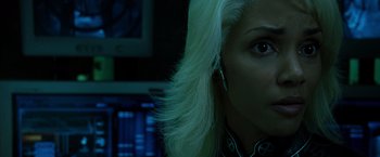 Movie still from “X2” (2003), directed by Bryan Singer – A person wearing a white wig; Close Up shot, Over the shoulder angle