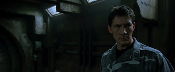 Movie still from “X2” (2003), directed by Bryan Singer – A person wearing a jacket; Close Up shot, Low angle