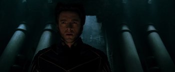 Movie still from “X2” (2003), directed by Bryan Singer – A person wearing a costume; Close Up shot, Low angle