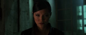 Movie still from “X2” (2003), directed by Bryan Singer – A person wearing a black shirt; Close Up shot, Low angle