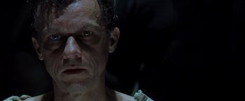 Movie still from “X2” (2003), directed by Bryan Singer – A person wearing a mask; Close Up shot, Low angle