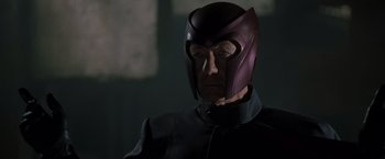 Movie still from “X2” (2003), directed by Bryan Singer – A man wearing a helmet and a black jacket; Close Up shot, Low angle