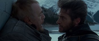 Movie still from “X2” (2003), directed by Bryan Singer – Two men standing next to each other near a body of water; Close Up shot, Over the shoulder angle