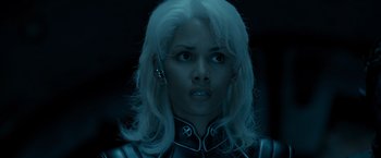 Movie still from “X2” (2003), directed by Bryan Singer – A woman with white blonde hair; Close Up shot, Low angle