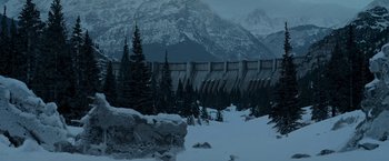 Movie still from “X2” (2003), directed by Bryan Singer – A snowy landscape with trees and mountains in the background; Extreme Wide shot, High angle