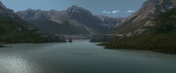 Movie still from “X2” (2003), directed by Bryan Singer – A large body of water near a mountain range; Extreme Wide shot, High angle