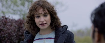Movie still from “Yesterday” (2019), directed by Danny Boyle – A person with curly hair; Close Up shot, Over the shoulder angle
