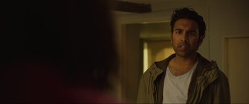 Movie still from “Yesterday” (2019), directed by Danny Boyle – A man standing in front of a window with his eyes wide open; Close Up shot, Over the shoulder angle