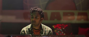 Movie still from “Yesterday” (2019), directed by Danny Boyle – A man sitting in front of a piano in a room; Close Up shot, Low angle