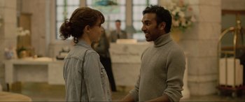 Movie still from “Yesterday” (2019), directed by Danny Boyle – A man and a woman talking to each other; Medium shot, Over the shoulder angle