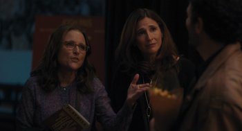 Movie still from “You Hurt My Feelings” (2023), directed by Nicole Holofcener – Two women standing next to each other in a room; Medium shot, Over the shoulder angle