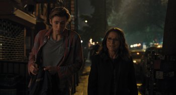 Movie still from “You Hurt My Feelings” (2023), directed by Nicole Holofcener – A man and a woman walking down a street at night; Medium shot, Over the shoulder angle
