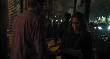 Movie still from “You Hurt My Feelings” (2023), directed by Nicole Holofcener – A woman standing next to a man on a sidewalk; Medium shot, Over the shoulder angle