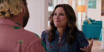 Movie still from “You People” (2023), directed by Kenya Barris – A person looking at a person; Close Up shot, Over the shoulder angle