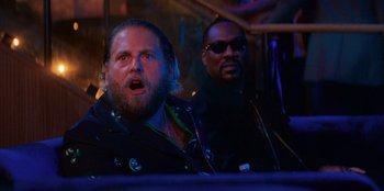Movie still from “You People” (2023), directed by Kenya Barris – A man with a beard and a man with a beard; Close Up shot, Over the shoulder angle