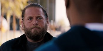 Movie still from “You People” (2023), directed by Kenya Barris – A man with a beard is talking to another man; Close Up shot, Over the shoulder angle