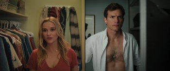 Movie still from “Your Place or Mine” (2023), directed by Aline Brosh McKenna – A man and a woman standing next to each other in front of a mirror; Medium shot, Over the shoulder angle