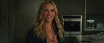 Movie still from “Your Place or Mine” (2023), directed by Aline Brosh McKenna – A person smiling for the camera; Close Up shot, Over the shoulder angle