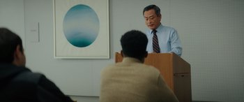 Movie still from “Your Place or Mine” (2023), directed by Aline Brosh McKenna – An older man is speaking to a young man; Medium shot, Over the shoulder angle