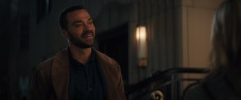 Movie still from “Your Place or Mine” (2023), directed by Aline Brosh McKenna – A man standing in front of a staircase; Medium shot, Over the shoulder angle