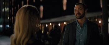 Movie still from “Your Place or Mine” (2023), directed by Aline Brosh McKenna – A man and a woman are sitting at a table; Close Up shot, Over the shoulder angle