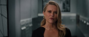 Movie still from “Your Place or Mine” (2023), directed by Aline Brosh McKenna – A woman with long blonde hair wearing a black shirt; Close Up shot, Over the shoulder angle