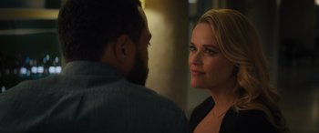 Movie still from “Your Place or Mine” (2023), directed by Aline Brosh McKenna – A man and a woman standing next to each other in a room; Close Up shot, Over the shoulder angle