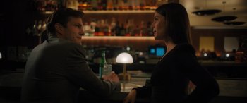 Movie still from “Your Place or Mine” (2023), directed by Aline Brosh McKenna – A man and a woman sitting at a bar talking; Medium shot, Over the shoulder angle