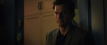 Movie still from “Your Place or Mine” (2023), directed by Aline Brosh McKenna – A person wearing a suit and tie; Close Up shot, Over the shoulder angle