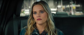 Movie still from “Your Place or Mine” (2023), directed by Aline Brosh McKenna – A person sitting in a car; Close Up shot, Over the shoulder angle