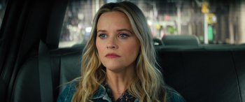 Movie still from “Your Place or Mine” (2023), directed by Aline Brosh McKenna – A person sitting in a car; Close Up shot, Over the shoulder angle