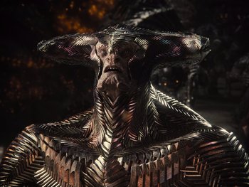 Movie still from “Zack Snyder's Justice League” (2021), directed by Zack Snyder – A statue of a man with a strange face; Close Up shot, High angle