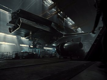 Movie still from “Zack Snyder's Justice League” (2021), directed by Zack Snyder – An airplane is being worked on in a hangar; Extreme Wide shot, High angle