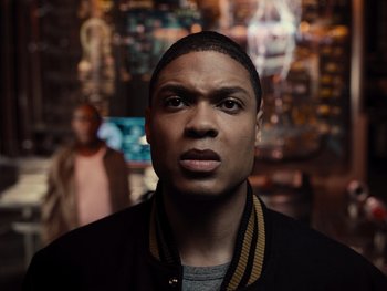 Movie still from “Zack Snyder's Justice League” (2021), directed by Zack Snyder – A person wearing a jacket; Close Up shot, Low angle