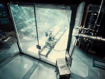 Movie still from “Zack Snyder's Justice League” (2021), directed by Zack Snyder – A view of a room from a window looking down; Wide shot, High angle