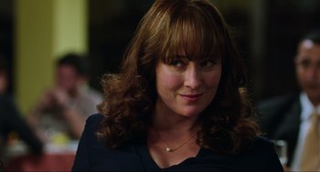 Movie still from “Zero Dark Thirty” (2012), directed by Kathryn Bigelow – A person wearing a black shirt; Close Up shot, Over the shoulder angle