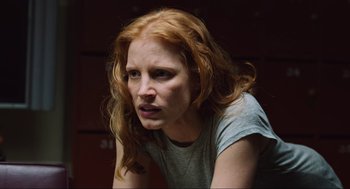 Movie still from “Zero Dark Thirty” (2012), directed by Kathryn Bigelow – A person with long hair; Close Up shot, Low angle