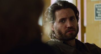 Movie still from “Zero Dark Thirty” (2012), directed by Kathryn Bigelow – A person with long hair; Close Up shot, Over the shoulder angle