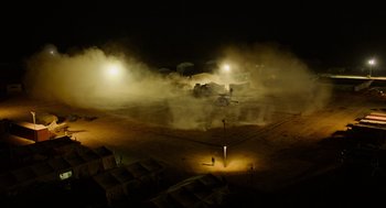 Movie still from “Zero Dark Thirty” (2012), directed by Kathryn Bigelow – An image of an airplane in the middle of a field at night; Extreme Wide shot, High angle