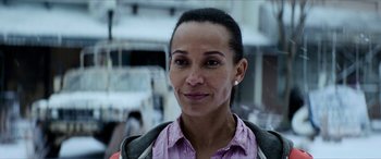 Movie still from “Zombieland: Double Tap” (2019), directed by Ruben Fleischer – A person wearing a shirt and jacket; Close Up shot, Over the shoulder angle