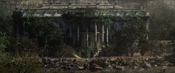 Movie still from “Zombieland: Double Tap” (2019), directed by Ruben Fleischer – An abandoned building with a lot of debris on the ground; Extreme Wide shot, High angle