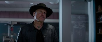 Movie still from “Zombieland: Double Tap” (2019), directed by Ruben Fleischer – A man wearing a hat and a leather jacket; Close Up shot, Low angle