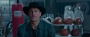 Movie still from “Zombieland: Double Tap” (2019), directed by Ruben Fleischer – A person wearing a hat; Close Up shot, Low angle