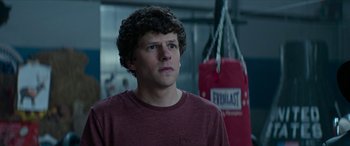 Movie still from “Zombieland: Double Tap” (2019), directed by Ruben Fleischer – A man standing in front of an everlast punching bag; Close Up shot, Over the shoulder angle